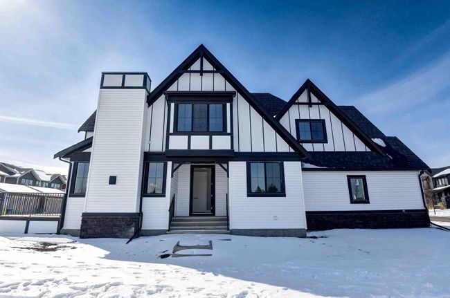 1209 Coopers Drive Sw, Home with 4 bedrooms, 2 bathrooms and 3 parking in Airdrie AB | Image 3