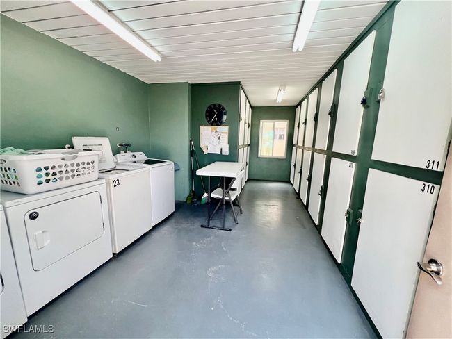 Common laundry room with private storage. | Image 22