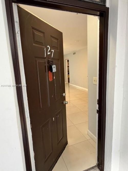 127-216 Lake Pointe Dr, Oakland Park, FL, 33309-3595 | Card Image