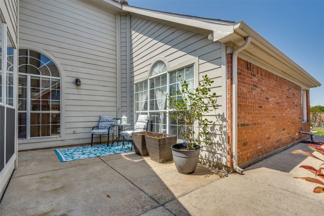 Surrounded on 3 sides, the courtyard-style patio is the perfect spot to relax and unwind. | Image 6