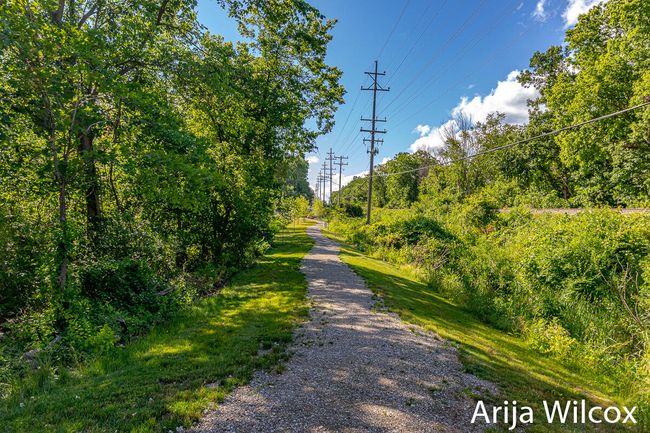 Beautiful trails lead you to the charming Village of Ada, just a stone's throw away. | Image 42