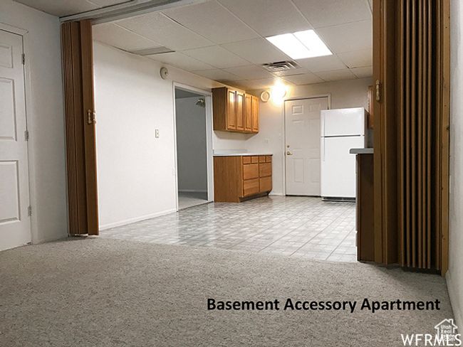 Spare room featuring visible vents, baseboards, and a paneled ceiling | Image 20