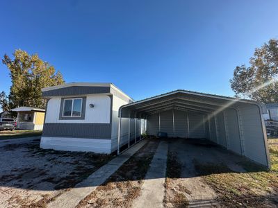 View of outbuilding with a carport | Image 3