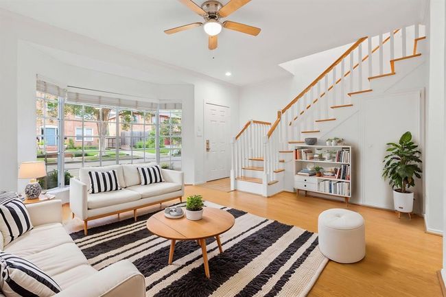 Sun drenched living room with Bay Windows overlooking Marshall St | Image 4