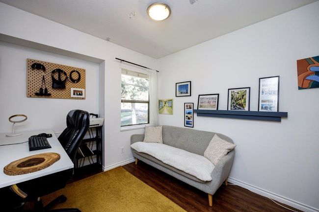 Home office featuring wood finished floors and baseboards | Image 11
