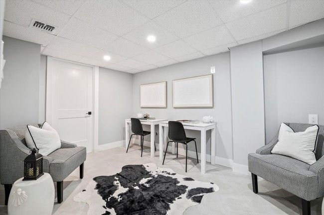 Office space featuring a paneled ceiling, recessed lighting, and light colored carpet | Image 24