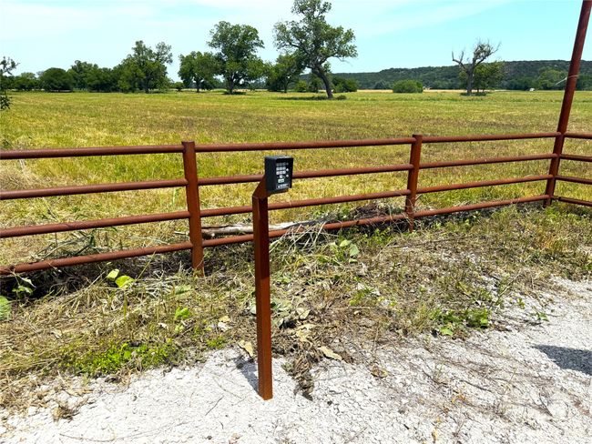 Gate featuring a view of countryside | Image 19