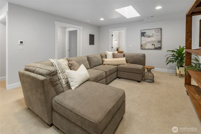 2nd floor family room with skylights. | Image 32