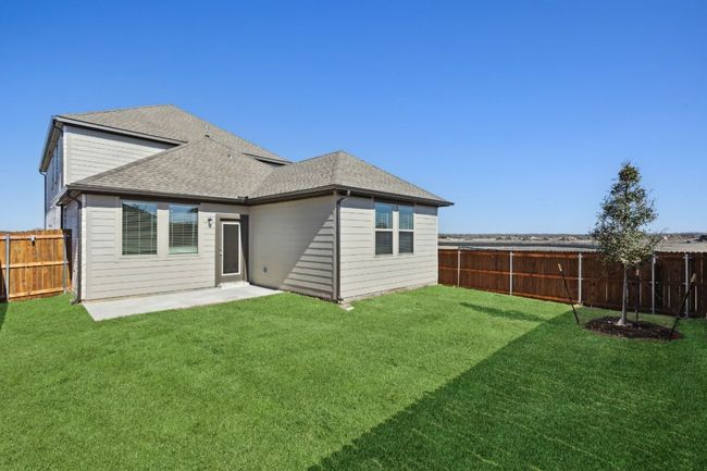 Rear view of house featuring roof with shingles | Image 24