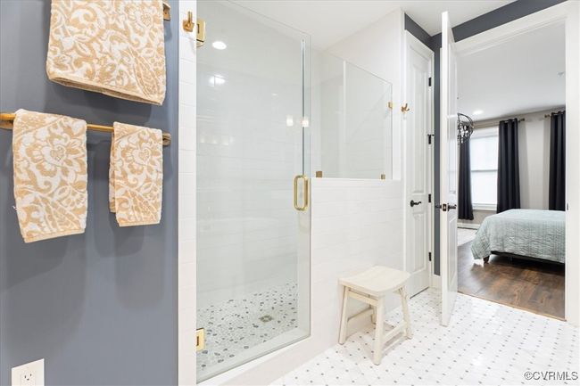 Bathroom featuring recessed lighting, ensuite bath, and a stall shower | Image 25