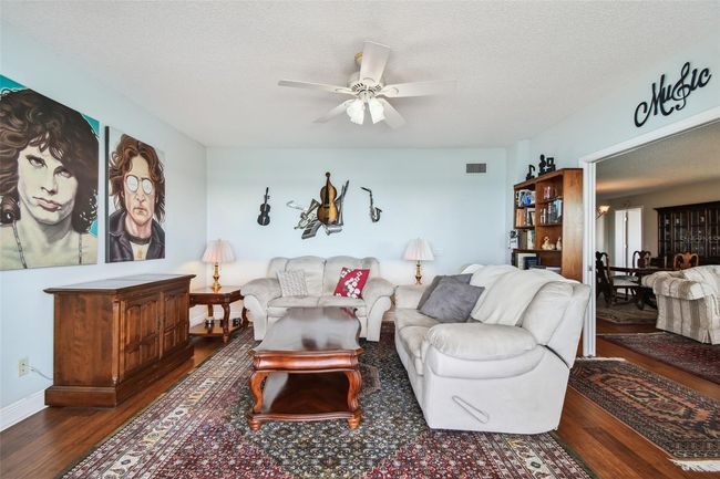 View from the balcony looking into the den. | Image 25