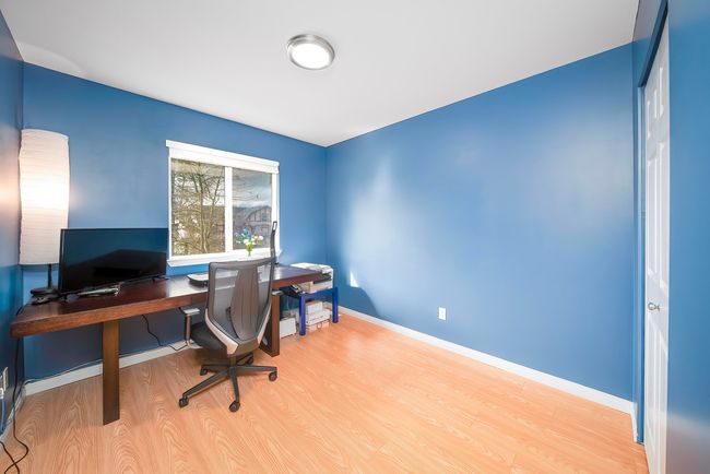 Office space featuring light wood-type flooring and baseboards | Image 32