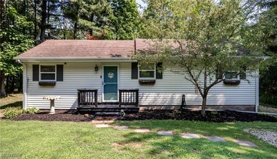 Private lake front ranch on dead end drive on a peninsula of Berlin Lake | Image 1