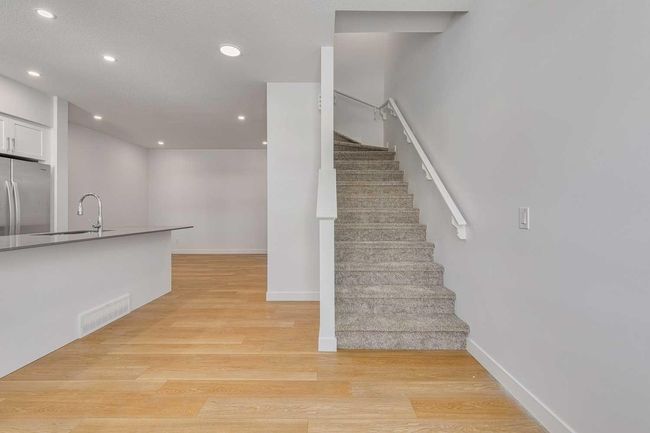 303 - 65 Belvedere Pt Se, Townhouse with 2 bedrooms, 3 bathrooms and 2 parking in Calgary AB | Image 12