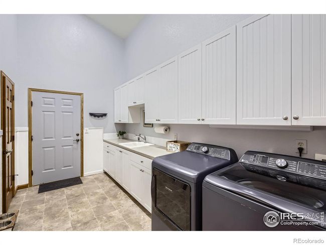 Large Laundry Room with tons of storage | Image 23