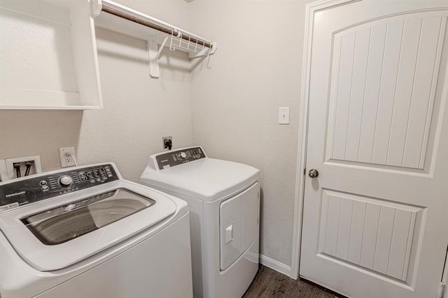 Utility room with garage access. | Image 36