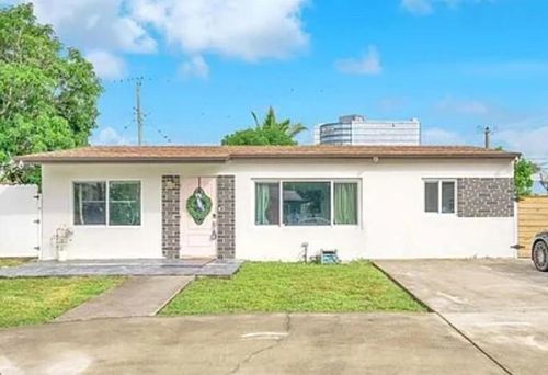 561 Ne 61st St, Oakland Park, FL, 33334-1930 | Card Image