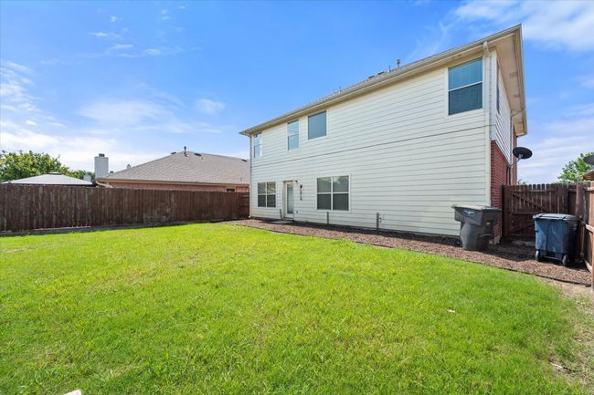 Rear view of property with a fenced backyard | Image 38