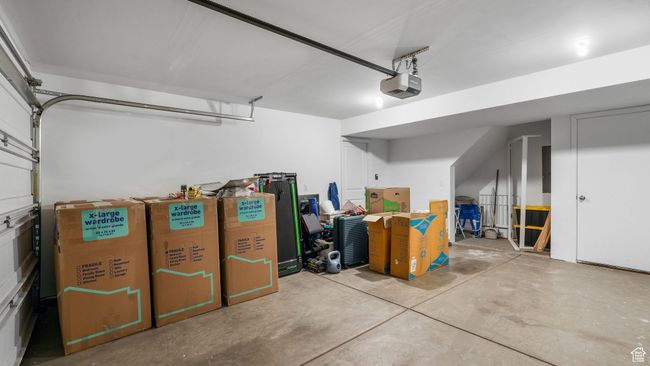 Garage with a garage door opener | Image 23