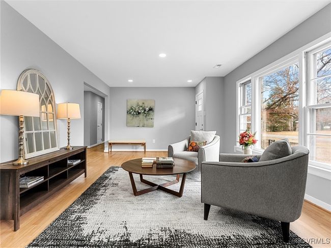 Living area featuring recessed lighting, baseboards, and light wood finished floors | Image 34