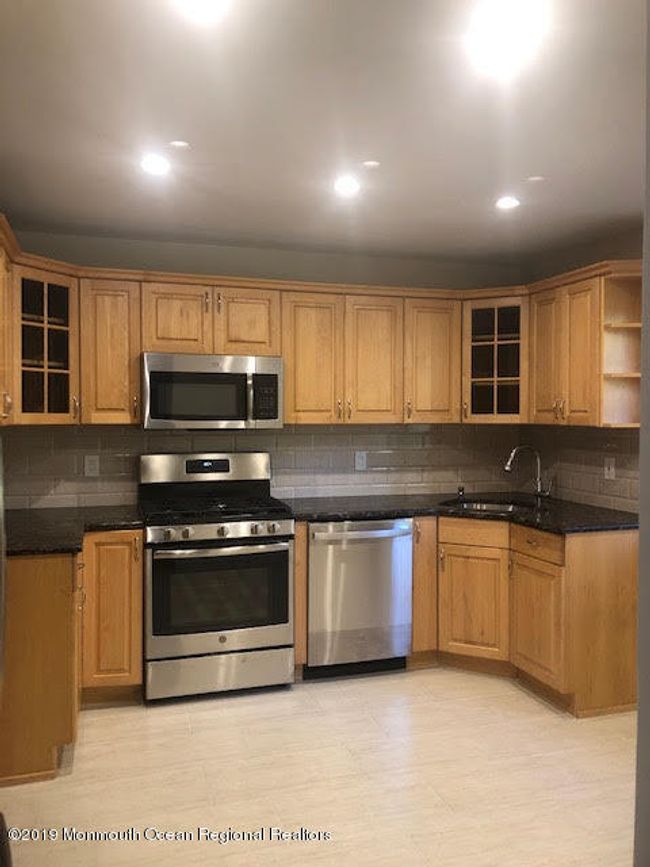 46 Dortmunder Dr, Townhouse with 4 bedrooms, 3 bathrooms and null parking in Manalapan NJ | Image 10