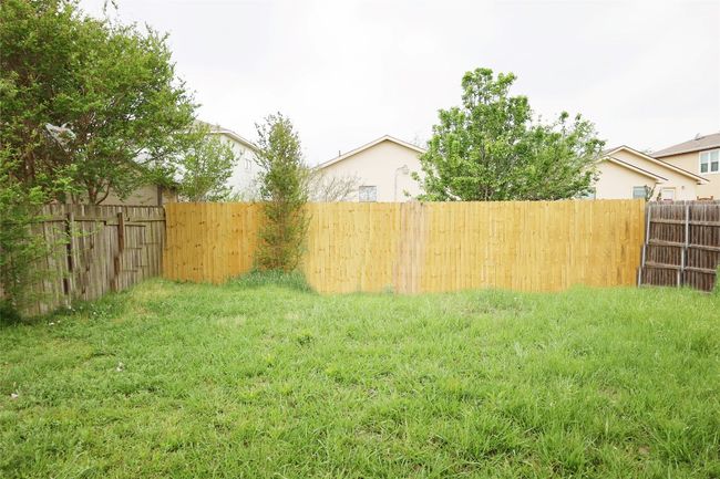 View of yard featuring a fenced backyard | Image 15