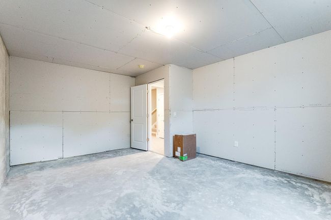 Potential for a future fifth bedroom and forth bathroom on the lower-level. Photo of model home, color and options will vary. | Image 39