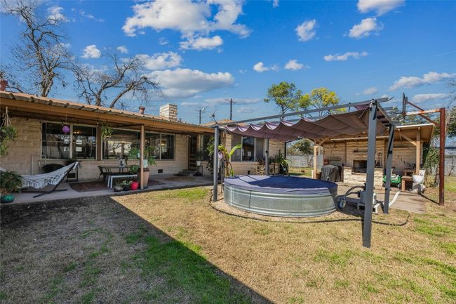 Starlit soaks in the Cowboy pool, movie nights on the porch, and plenty of room to garden, roam, or keep chickens - this backyard’s got stories to tell | Image 18