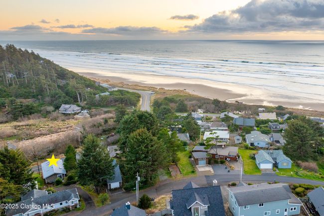 The beach is right there, town is just around that corner! | Image 26
