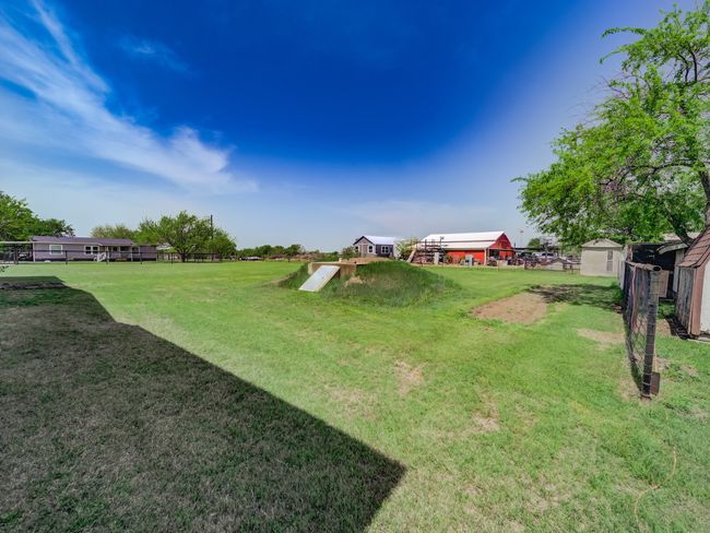 View of yard featuring fence | Image 31