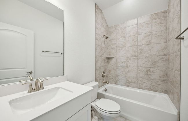 Secondary bathroom featuring modern upgrades and finishes *Real home pictured | Image 17