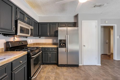 1153 Brookswood Ave, Austin, TX, 78721-2448 | Card Image