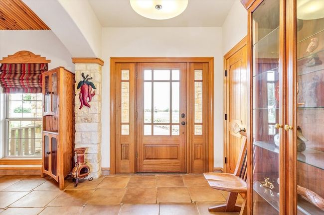 View of tiled entrance foyer | Image 8