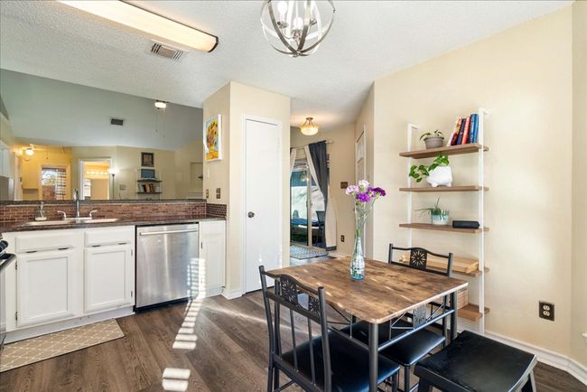 Generous dining space in kitchen, open to living. | Image 13