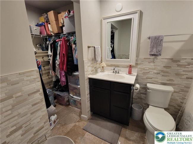 Walk in closet in Primary Bathroom | Image 9