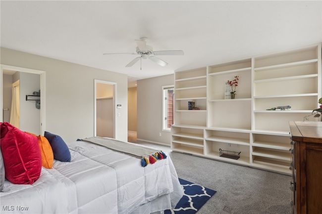 Bedroom featuring a ceiling fan and​​‌​​​​‌​​‌‌​‌‌​​​‌‌​​‌‌​‌​​​​​‌ carpet | Image 27