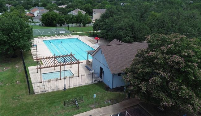 Community pool with a patio | Image 25