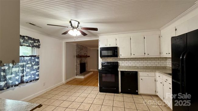 Kitchen with LR Fireplace | Image 12