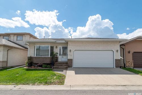 59 Greensboro Dr, House with 2 bedrooms, 3 bathrooms and 4 parking in Regina SK | Card Image