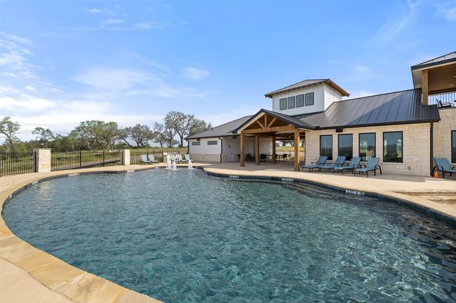 Community pool featuring a patio | Image 22