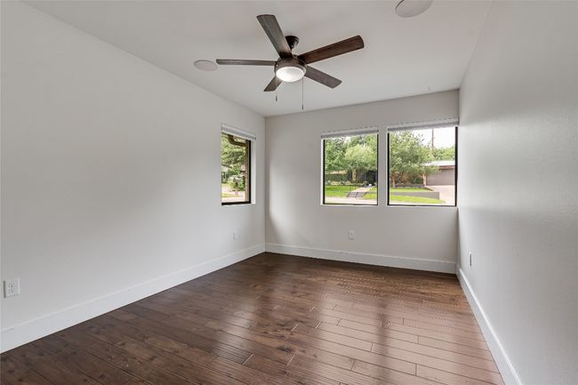 Two additional bedrooms sit in their own hallway apart from this primary suite, which is excellent for privacy. | Image 29