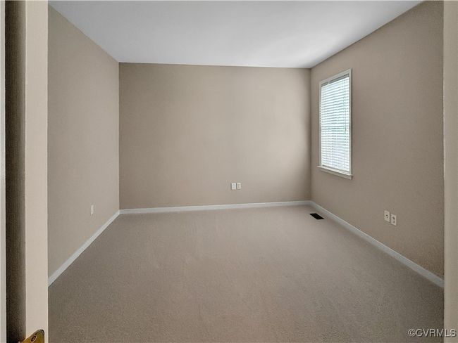 Carpeted empty room with baseboards | Image 10