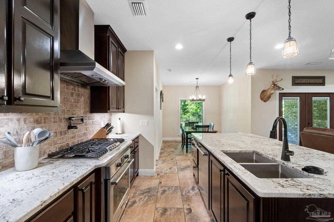 9241 Sage Forest Ln, House other with 3 bedrooms, 3 bathrooms and 2 parking in Pace FL | Image 10