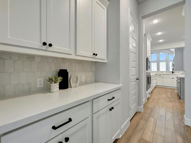 Butlers pantry for additional kitchen storage | Image 13