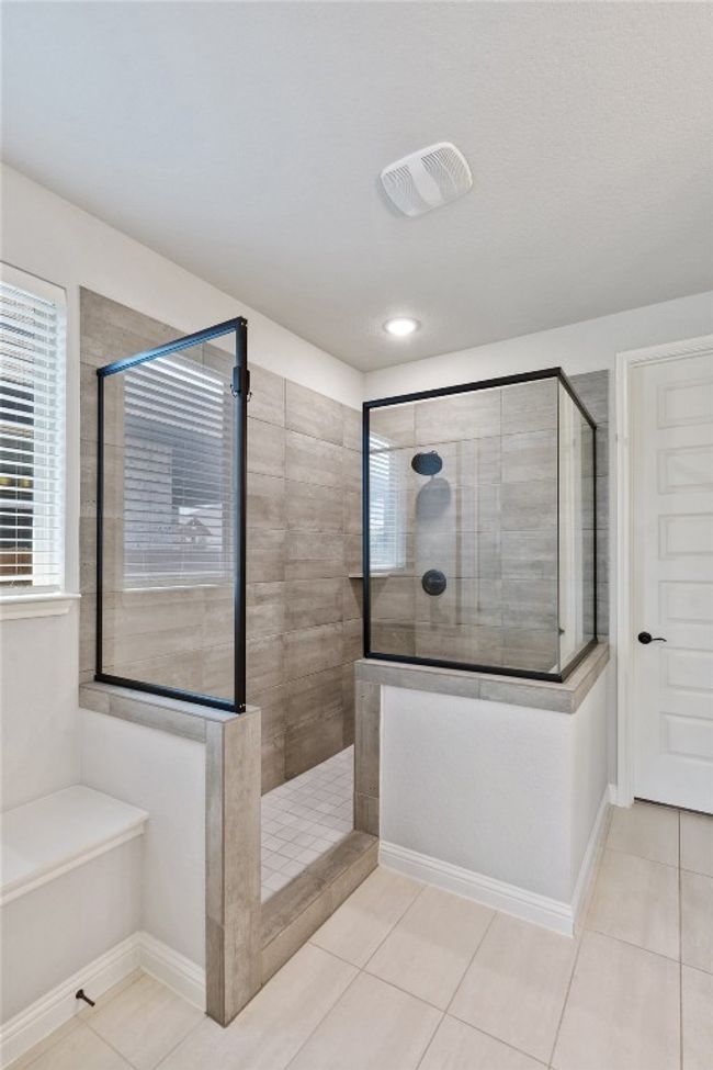 Full bathroom with tile patterned flooring and a walk in shower | Image 20