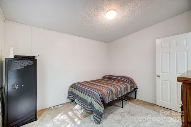 The second bedroom is awaiting your special touch. | Image 25
