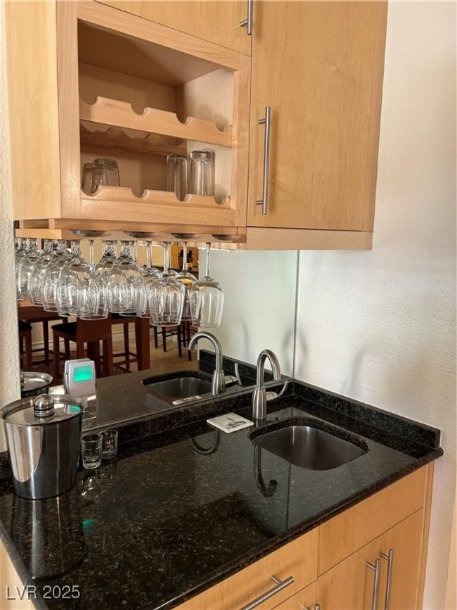 Bar featuring a sink | Image 33