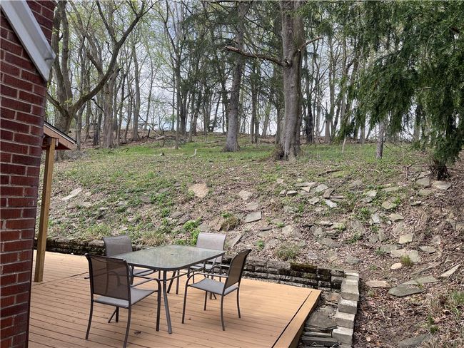 wooded view, house is on a double lot | Image 6
