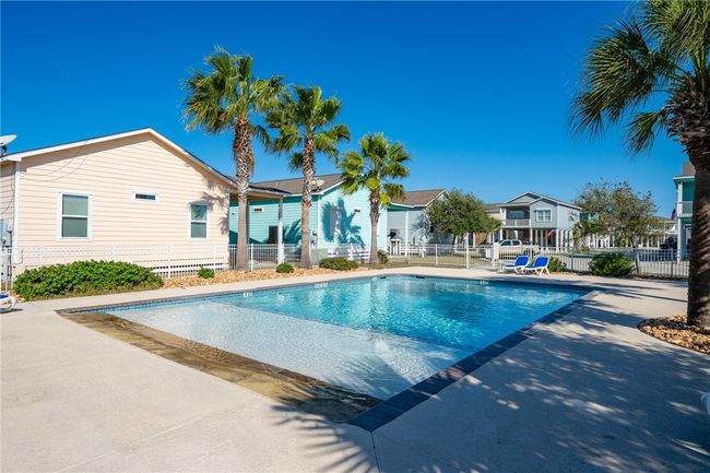 SPARKLING pool with a beach entry for lounging and kids' play! | Image 28