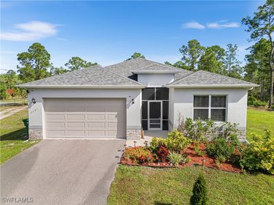 2687 56th Avenue Ne, House other with 4 bedrooms, 2 bathrooms and null parking in Naples FL | Image 2